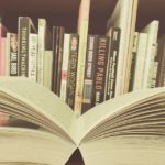 Books stacked on a shelf