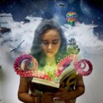 A young girl reads a book and her imagination is stimulated