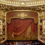 A stage in an ornate theater