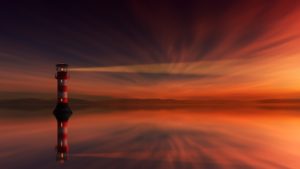 A lighthouse at sunset